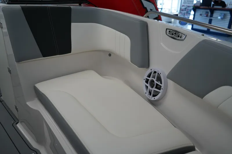 Slide: The Image of 2024 Chaparral 23 SSi OB boat interior with cushioned seating and speaker. - 34