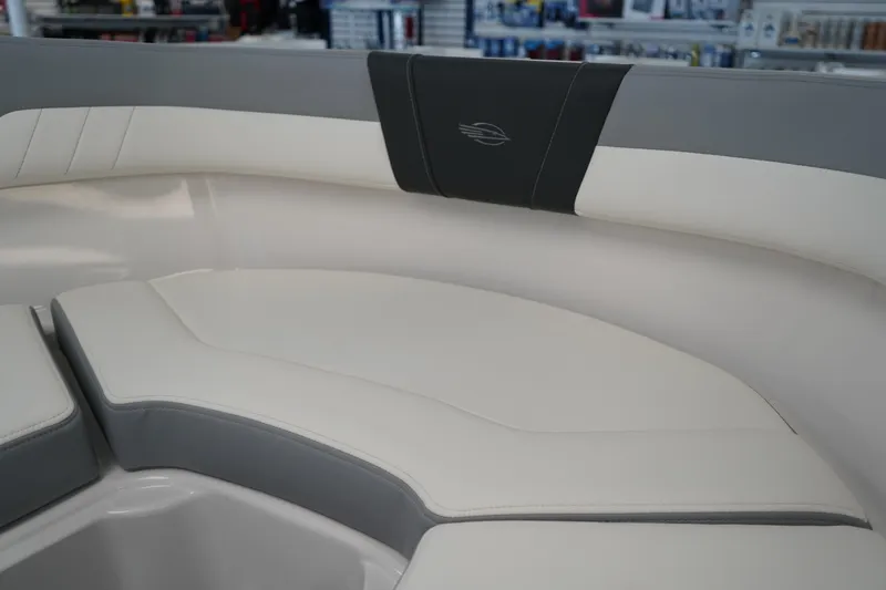Slide: The Image of 2024 Chaparral 23 SSi OB boat interior with sleek, modern seating design. - 37