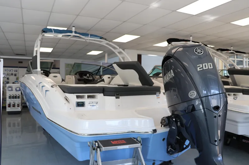 Slide: The Image of 2024 Chaparral 23 SSi OB boat with Yamaha 200 engine in showroom. - 4