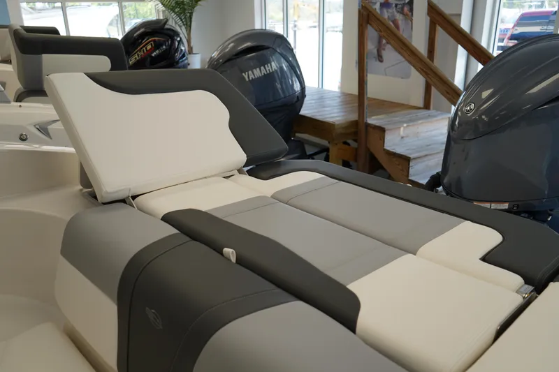 Slide: The Image of 2024 Chaparral 23 SSi OB boat interior with Yamaha outboard engines. - 6