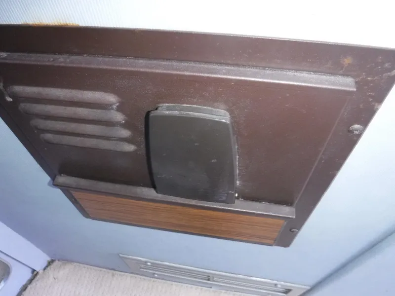 Slide: The Image of 1988 Trojan 12 Meter interior panel with vent and control switch. - 18