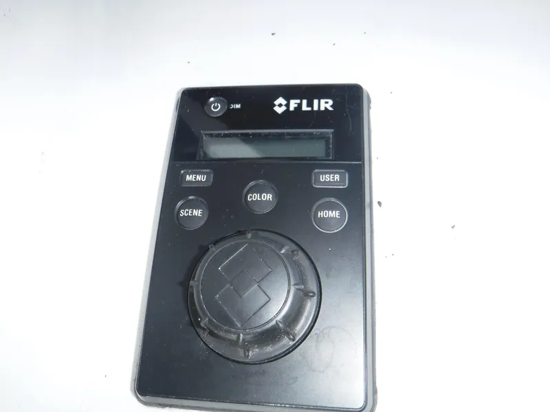 Slide: The Image of FLIR control panel with buttons and dial, 1988 Trojan 12 Meter model. - 37