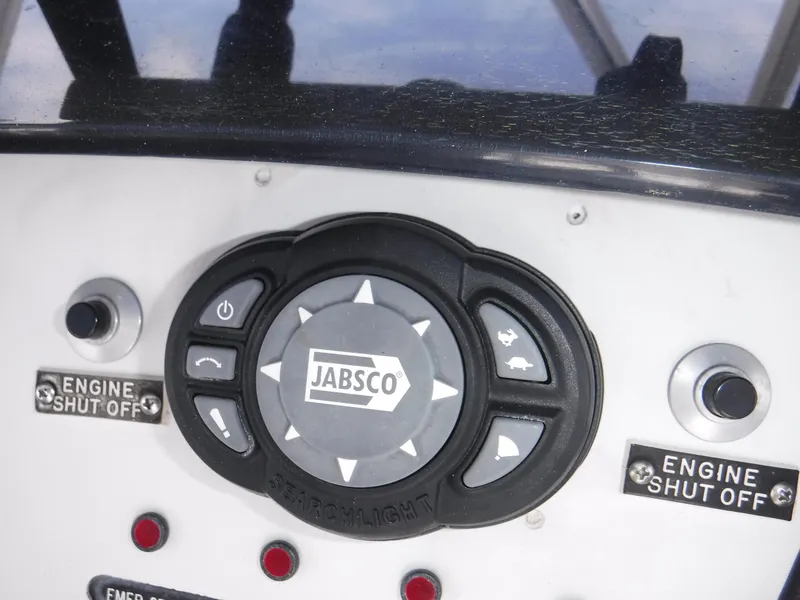 Slide: The Image of Control panel of a 1988 Trojan 12 Meter boat with Jabsco spotlight controls. - 40