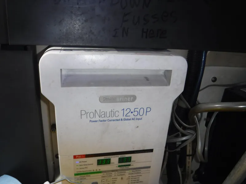 Slide: The Image of ProNautic 12-50P battery charger in a 1988 Trojan 12 Meter boat. - 7