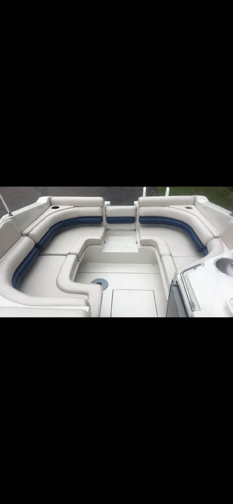 Slide: The Image of 1997 Regal Ventura 8.3 SC boat interior with spacious seating and sleek design. - 9