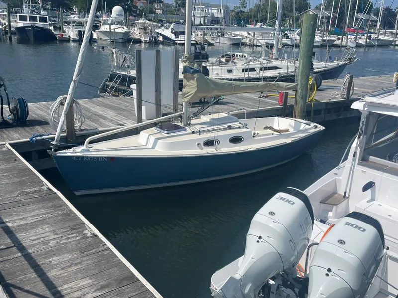 Slide: The Image of 2008 Schock Harbor 25 sailboat docked at a marina. - 17