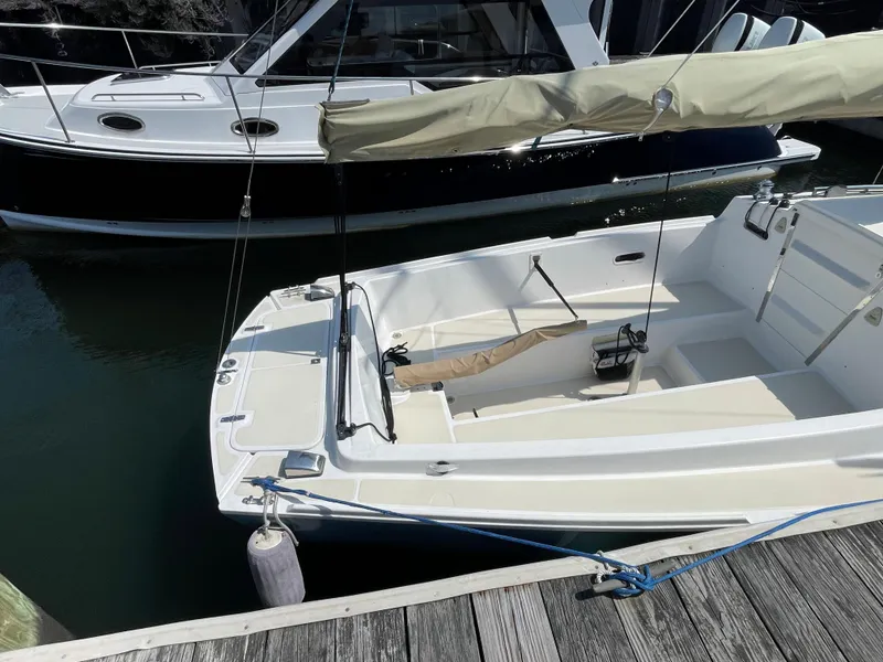 Slide: The Image of 2008 Schock Harbor 25 sailboat docked in marina. - 2