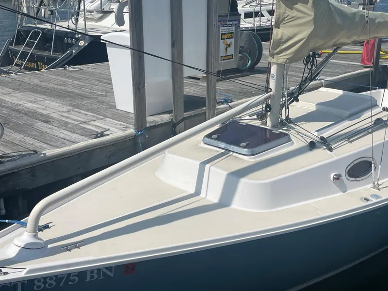 Slide: The Image of 2008 Schock Harbor 25 sailboat docked at a marina. - 4