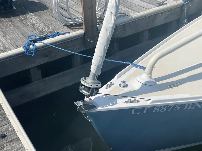 Slide: The Image of 2008 Schock Harbor 25 sailboat docked, showing bow and registration number CT 8875 BN. - 5