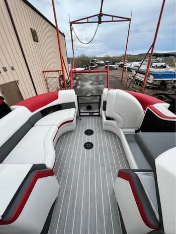 Slide: The Image of 2023 South Bay 525 RS Arch 3.0+ pontoon boat with stylish seating and modern design. - 10