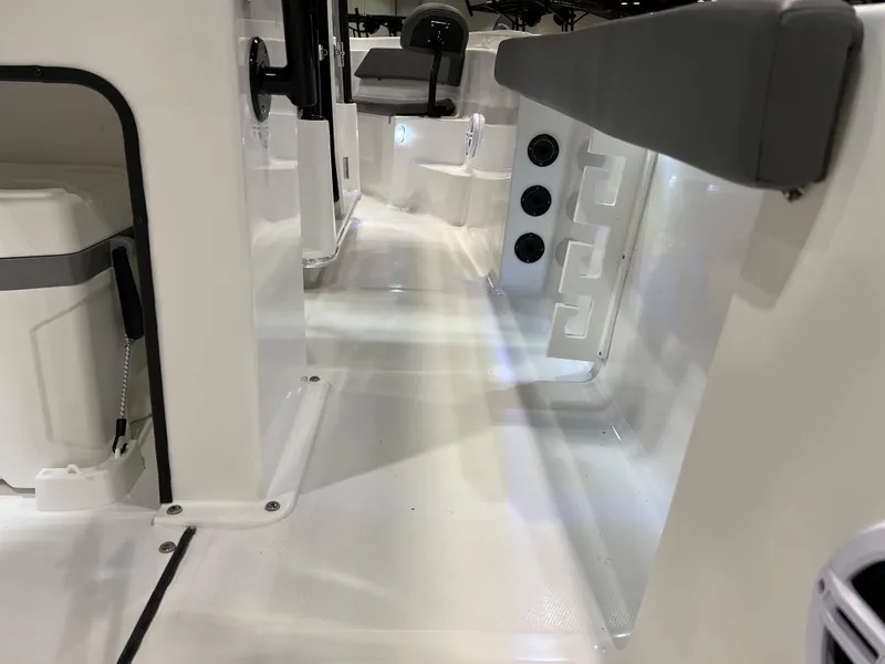 Slide: The Image of 2024 Polar 220 boat interior with seating and storage compartments. - 15
