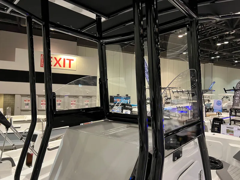 Slide: The Image of 2024 Polar 220 boat interior at a boat show. - 6