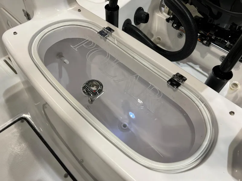 Slide: The Image of 2024 Polar 220 boat livewell with clear lid and interior light. - 7