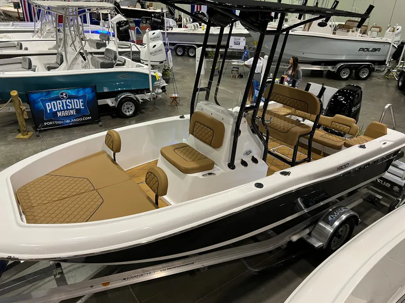 Slide: The Image of 2024 Clearwater 1900 boat on display at a marine exhibition. - 1