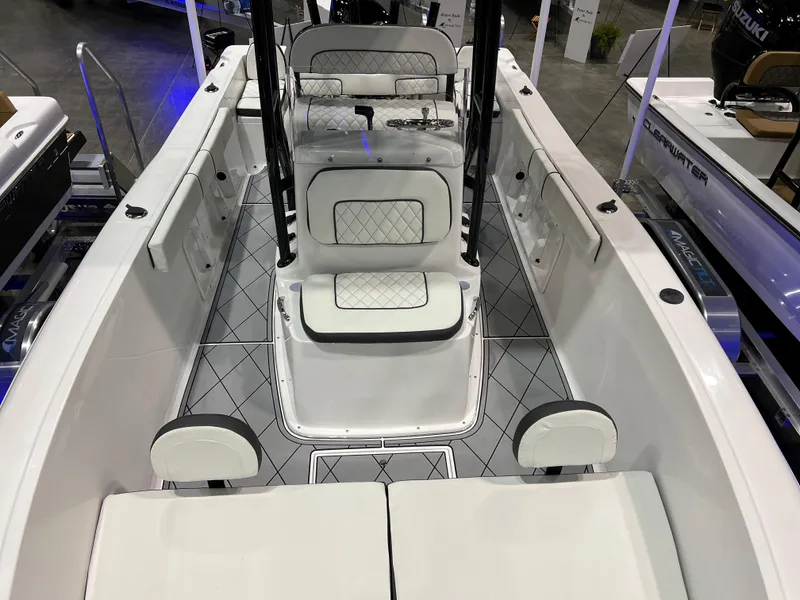 Slide: The Image of Clearwater 2000 2024 model boat interior with white cushioned seating and modern design. - 13