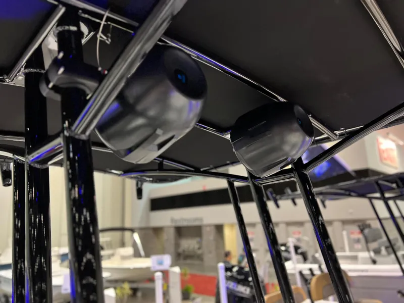 Slide: The Image of 2024 Clearwater 2000 boat with mounted speakers on the canopy. - 17