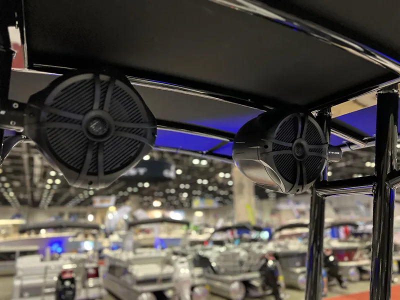Slide: The Image of 2024 Clearwater 2000 boat speakers at a boat show. - 18