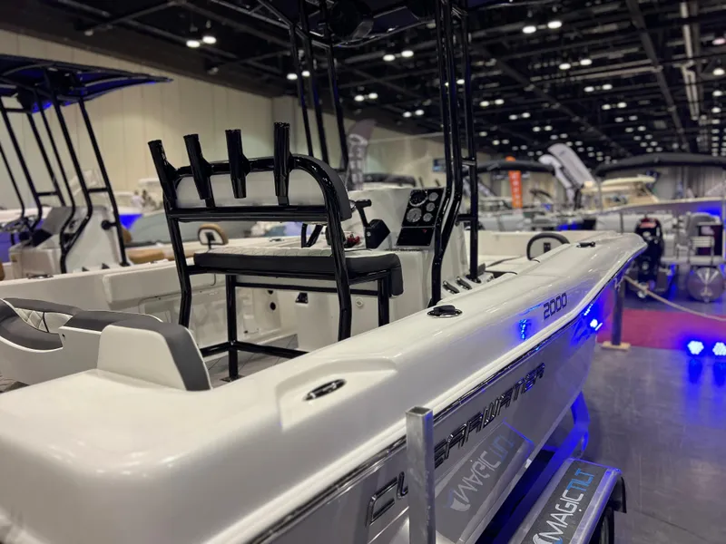 Slide: The Image of Clearwater 2000 boat model 2024 displayed at a boat show. - 22