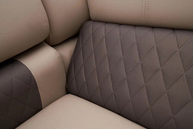 Slide: The Image of 2024 Sun Tracker Fishin' Barge 22 XP3, close-up of luxurious, diamond-stitched upholstery. - 25