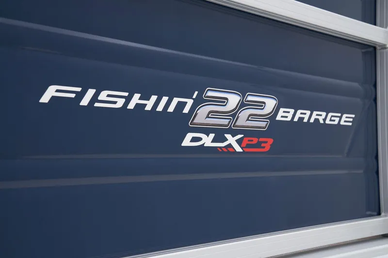 Slide: The Image of 2024 Sun Tracker Fishin' Barge 22 XP3 logo on blue background. - 26