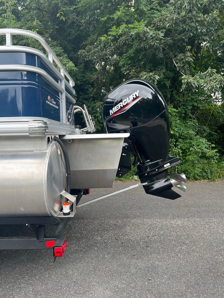 Slide: The Image of 2024 Sun Tracker Fishin' Barge 22 XP3 with Mercury outboard motor. - 4
