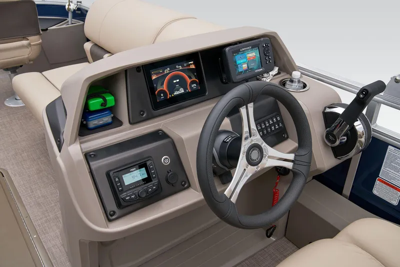 Slide: The Image of 2024 Sun Tracker Fishin' Barge 22 XP3 helm with modern controls and navigation displays. - 48