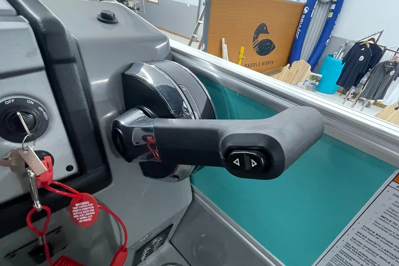 Slide: The Image of Throttle control of a 2023 Berkshire 22 RFX CTS boat. - 5