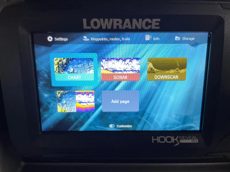 Slide: The Image of Lowrance Hook Reveal fish finder display on 2023 Berkshire 22 RFX CTS boat. - 7