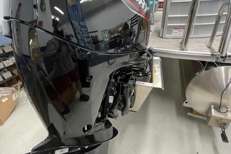 Slide: The Image of 2023 Berkshire 22 RFX CTS boat engine and rear deck in showroom. - 9