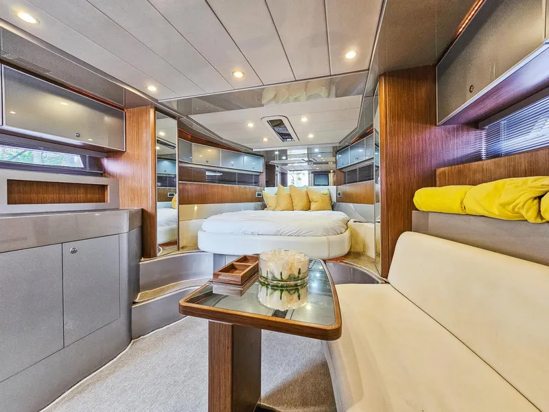 Slide: The Image of Luxurious interior of 2010 Riva Rama yacht with modern furnishings and cozy seating. - 18