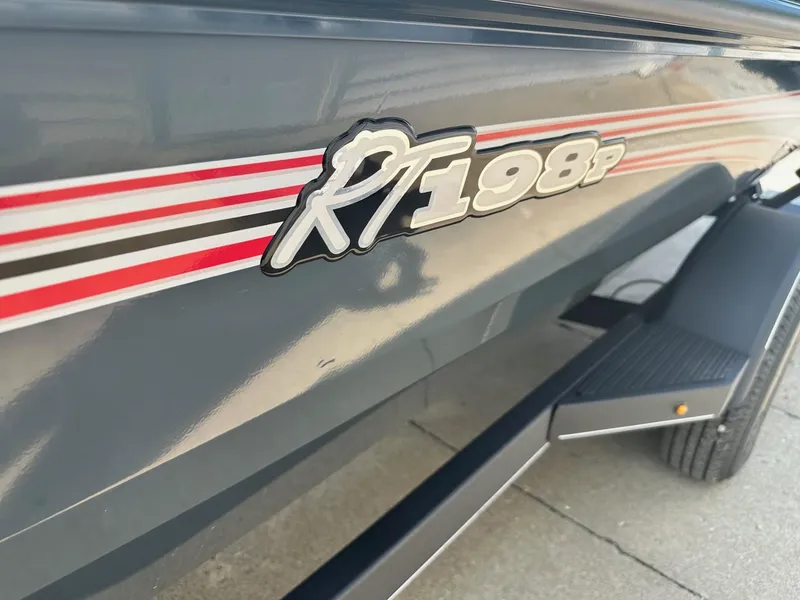 Slide: The Image of 2024 Ranger RT198P boat side view with model decal. - 10
