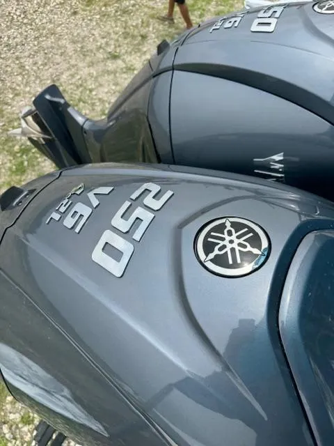 Slide: The Image of Yamaha 250 V6 outboard engines on a 2024 Robalo 270 CC boat. - 3