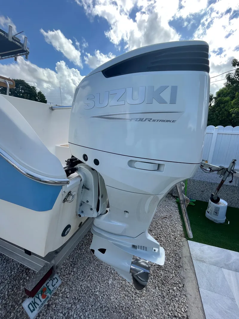 Slide: The Image of 2004 World Cat 270 SF with Suzuki outboard motor. - 15