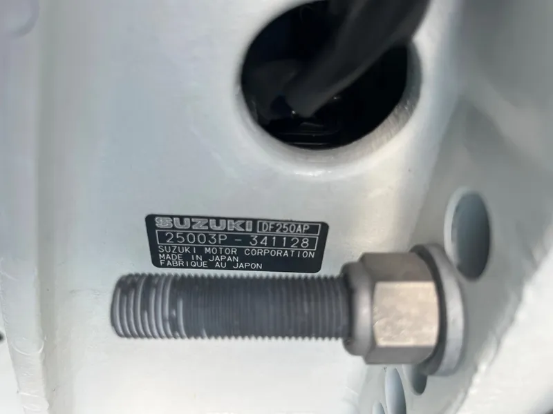Slide: The Image of Close-up of Suzuki DF250AP engine part on 2004 World Cat 270 SF boat. - 18