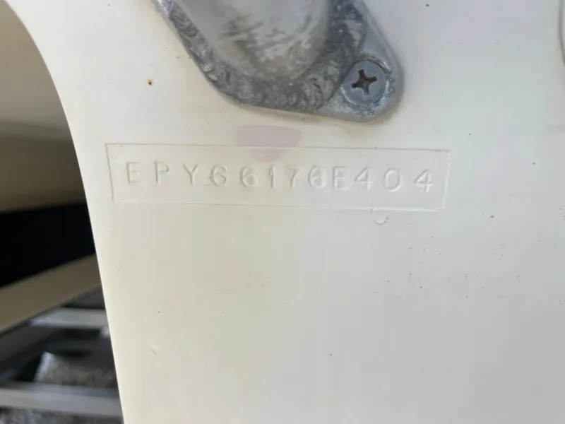 Slide: The Image of Hull Identification Number (HIN) on a 2004 World Cat 270 SF boat. - 19