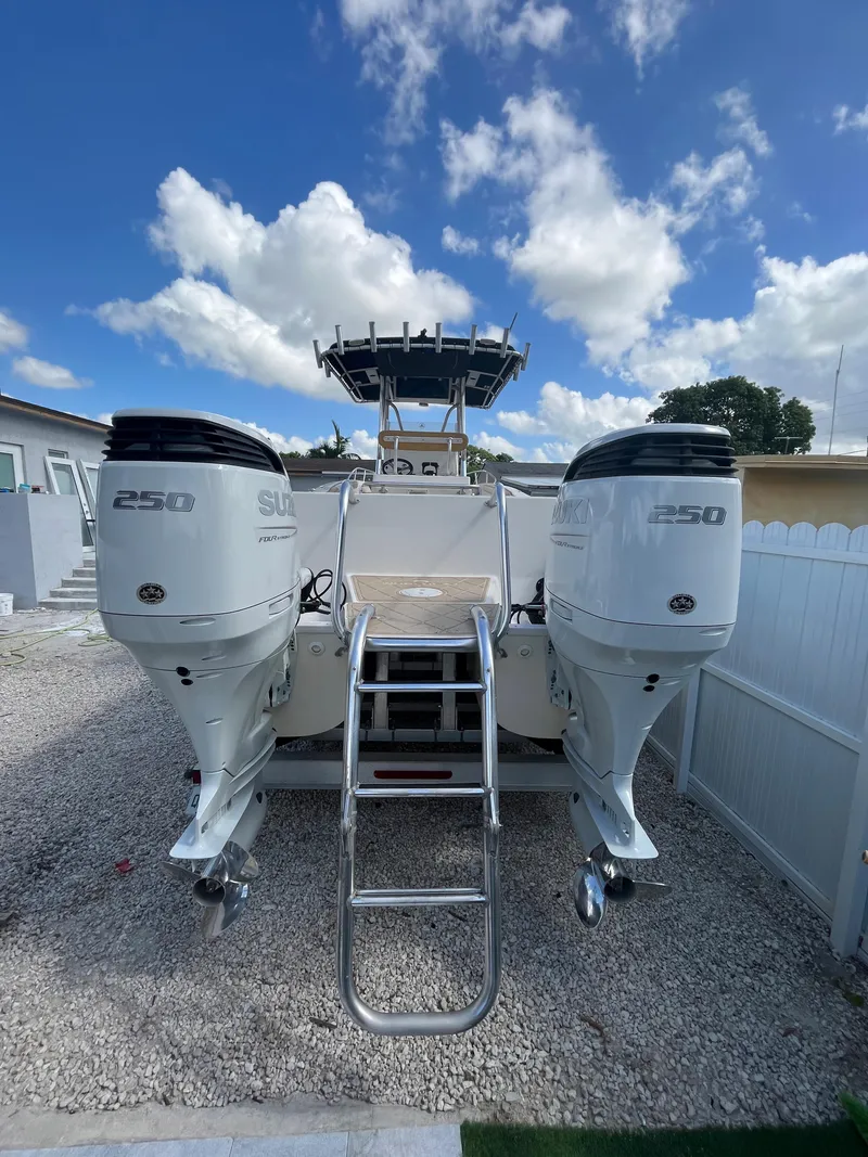 Slide: The Image of 2004 World Cat 270 SF boat with twin 250 HP engines. - 20