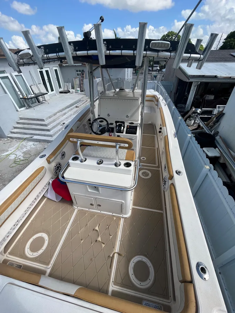 Slide: The Image of 2004 World Cat 270 SF boat with spacious deck and modern amenities. - 22