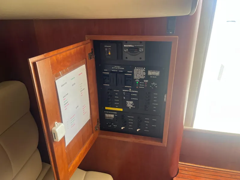 Slide: The Image of Electrical panel inside 2008 Rampage 30 Express boat cabin. - 15