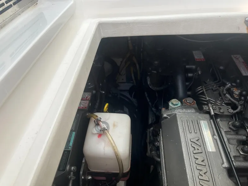 Slide: The Image of Engine compartment of 2008 Rampage 30 Express boat with Yanmar engine. - 28