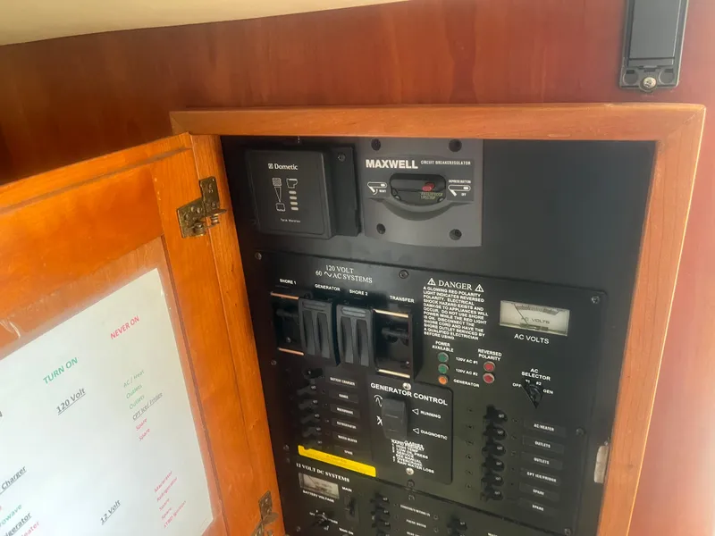 Slide: The Image of Electrical control panel inside a 2008 Rampage 30 Express boat. - 38