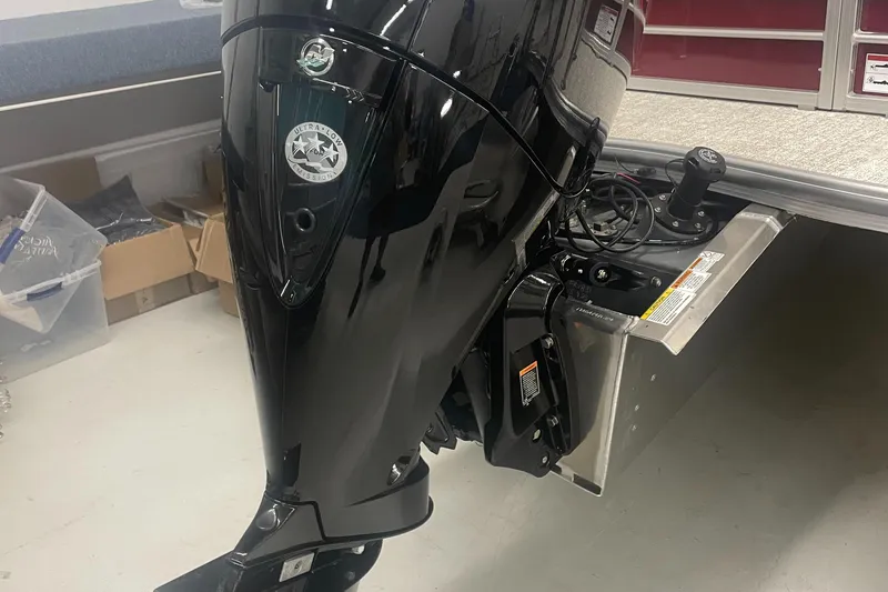 Slide: The Image of 2023 Berkshire 22CL CTS boat motor in a workshop. - 3