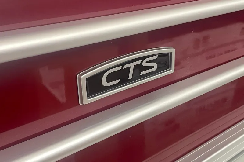 Slide: The Image of Close-up of 2023 Berkshire 22CL CTS model emblem on red background. - 5