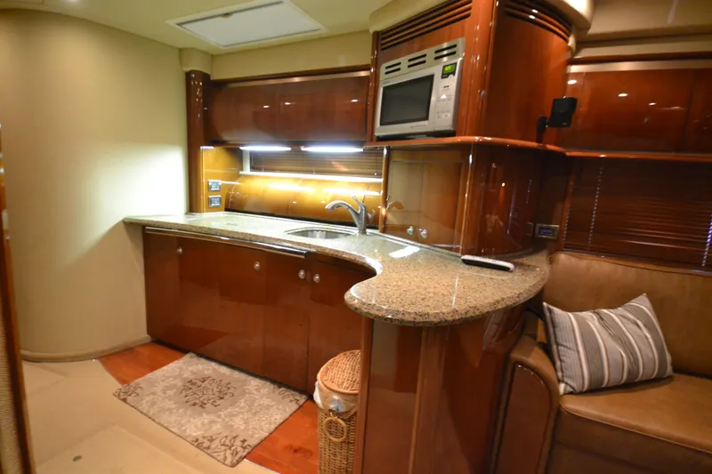 Slide: The Image of Luxurious kitchen on a 2007 Sea Ray 520 Sundancer yacht. - 18