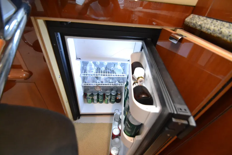 Slide: The Image of Fridge in 2007 Sea Ray 520 Sundancer stocked with drinks. - 20