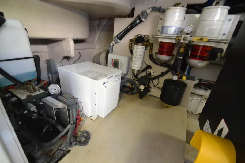 Slide: The Image of Engine room of 2007 Sea Ray 520 Sundancer with technical components. - 29