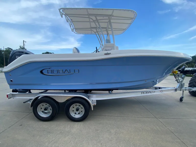 Slide: The Image of 2024 Robalo 202 EXPLORER boat on a trailer, side view. - 1