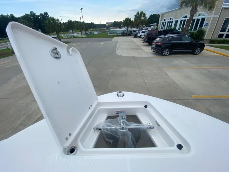 Slide: The Image of Open storage compartment on a 2024 Robalo 202 EXPLORER boat. - 20