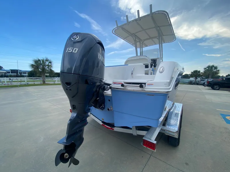 Slide: The Image of 2024 Robalo 202 EXPLORER boat with Yamaha 150 outboard motor on trailer. - 3