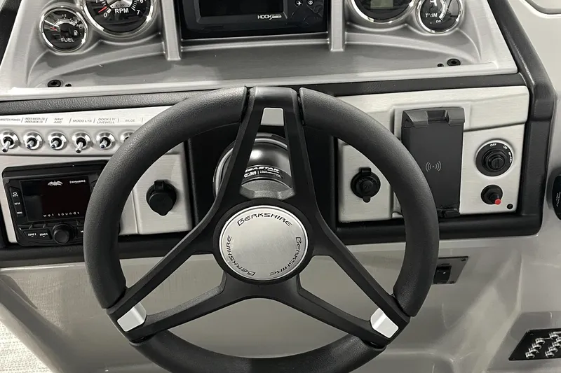 Slide: The Image of Steering wheel and dashboard of 2023 Berkshire 22RFX CTS boat. - 11