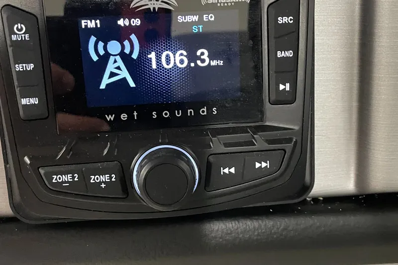 Slide: The Image of Close-up of 2023 Berkshire 22RFX CTS radio display showing 106.3 MHz FM station. - 12